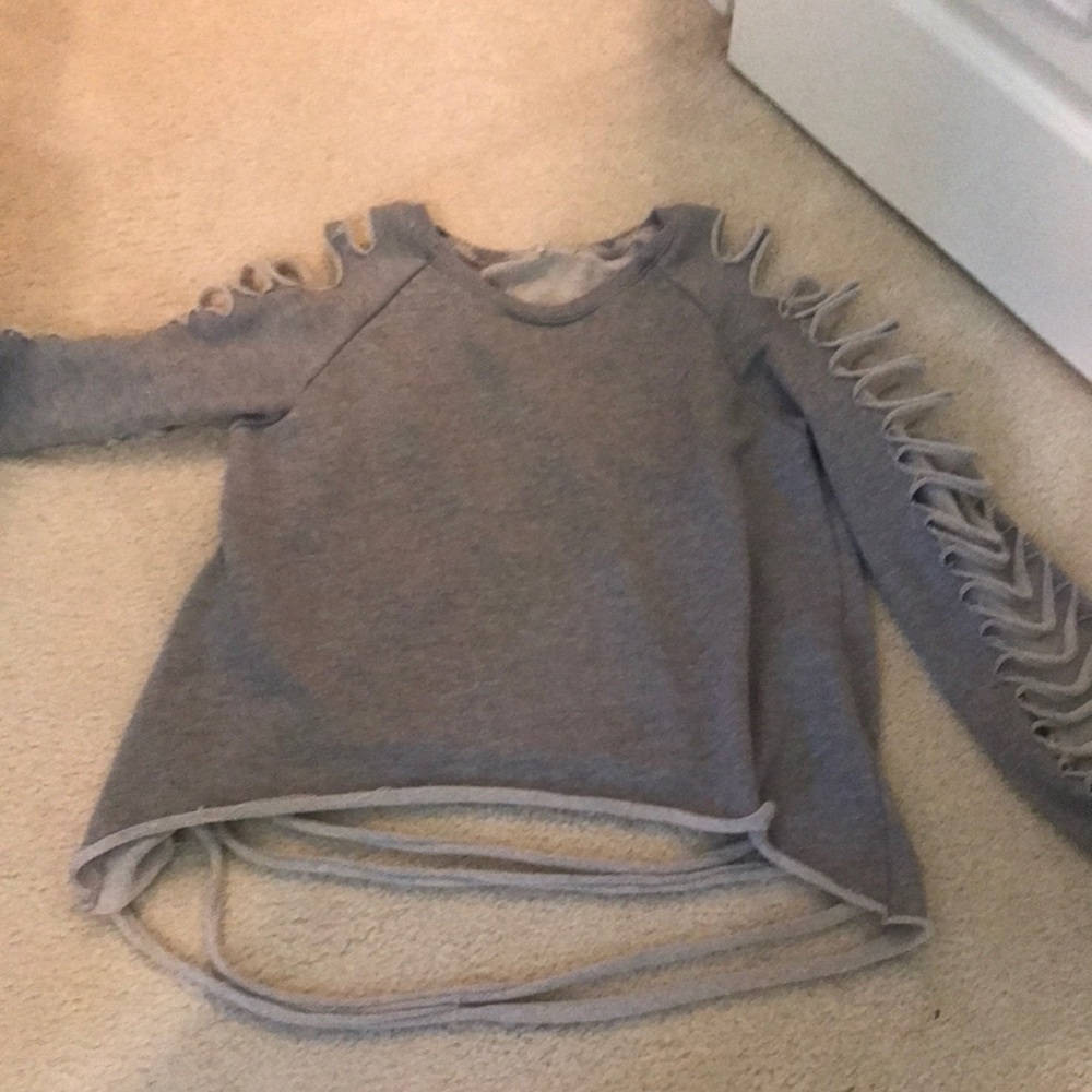 A grey sweater